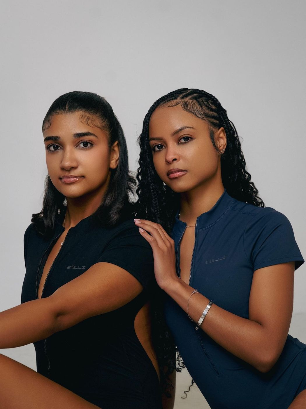 Black and navy Bellz bodysuits, studio